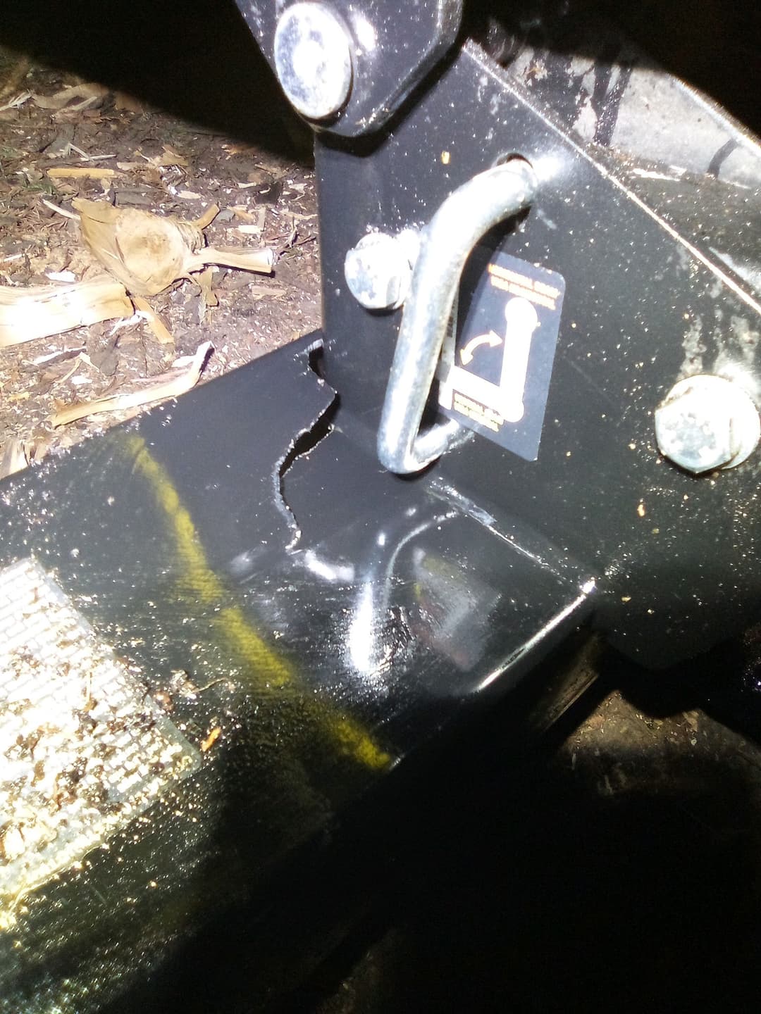 before picture of a broken piece of metal